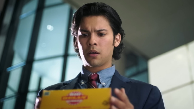 Jaime Reyes holding burger box