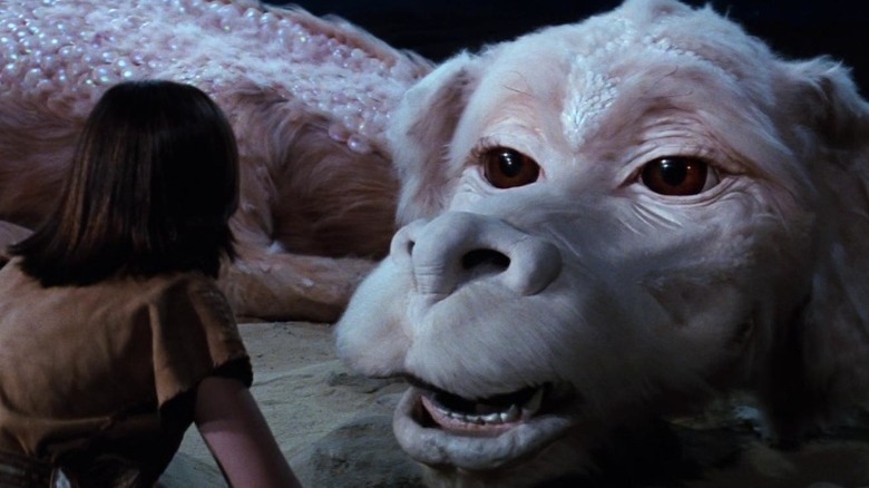 Atreyu talking to Falcor the dragon