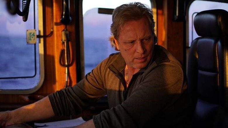 Captain Sig Hansen steering the boat 