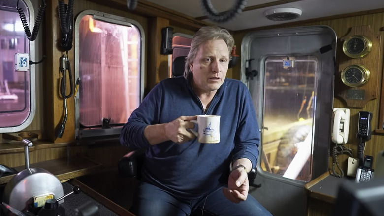 Sig Hansen drinking coffee in the captain's cabin