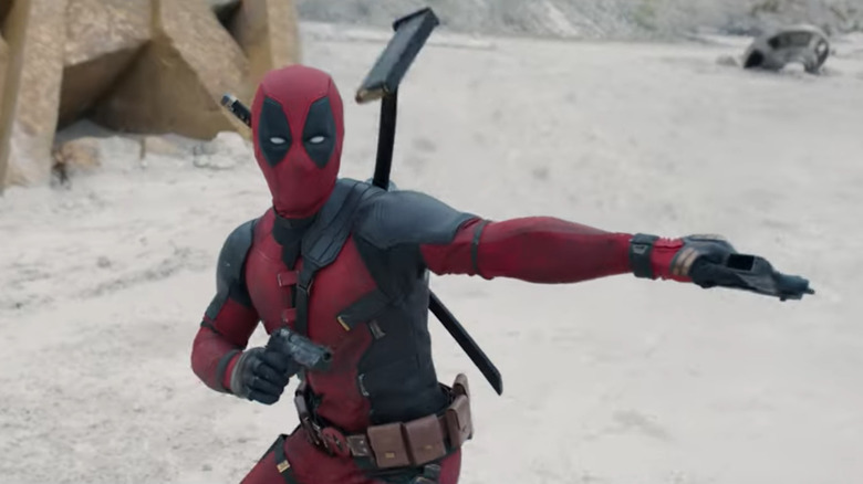 Deadpool fighting with two guns