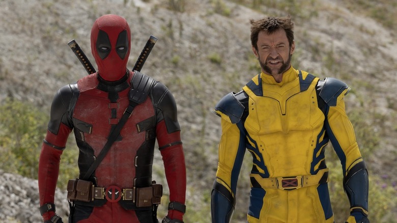 Deadpool and Wolverine standing outside