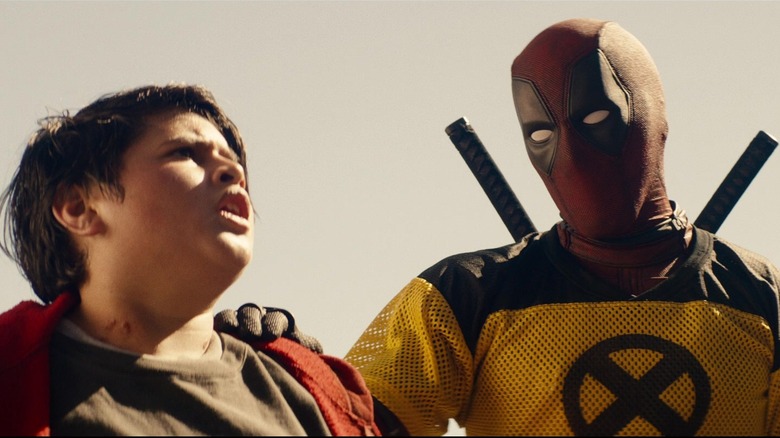 Deadpool comforting Russell