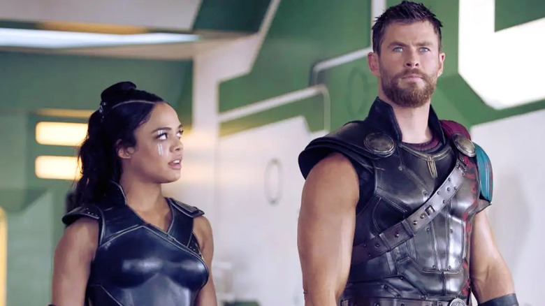 Valkyrie looks up at Thor