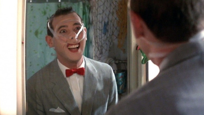 Pee-wee Herman covered in tape