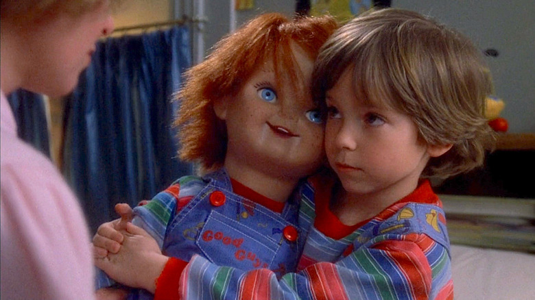 Andy hugs Chucky close