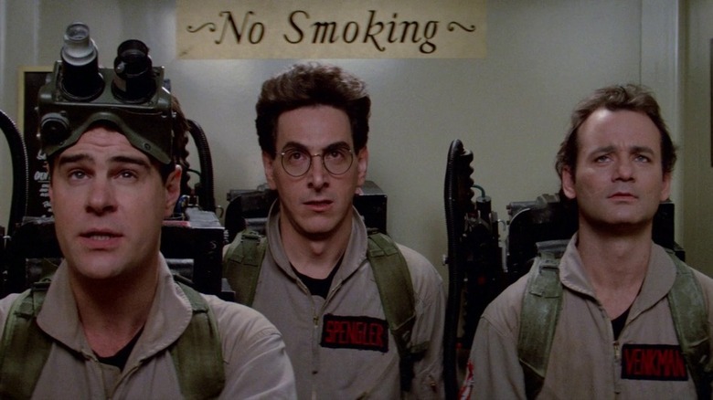 The Ghostbusters in an elevator