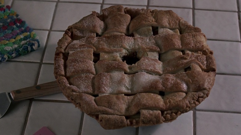 The apple pie on a kitchen counter