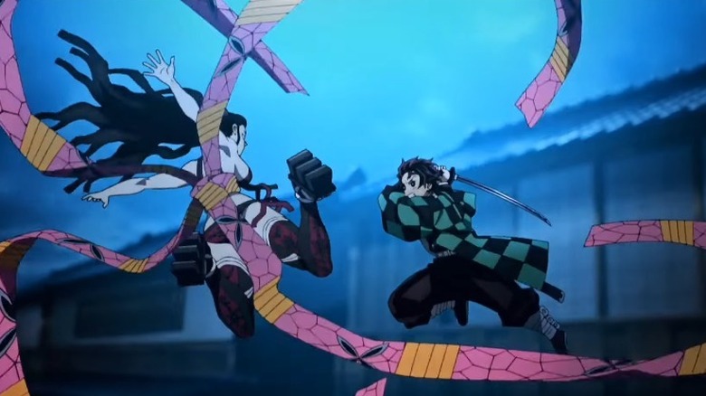 Daki and Tanjiro fighting