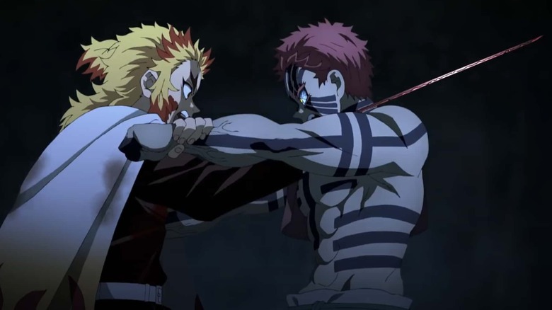 Rengoku and Akaza fight in Demon Slayer: Mugen Train