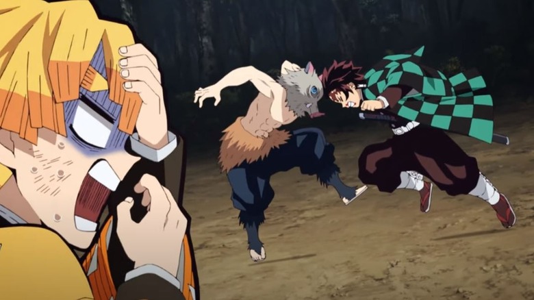 Tanjiro headbutting Inosuke