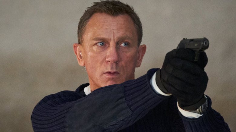 James Bond holding a pistol