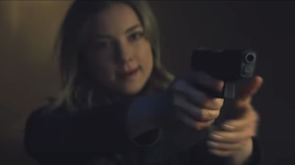 Sharon Carter pointing gun