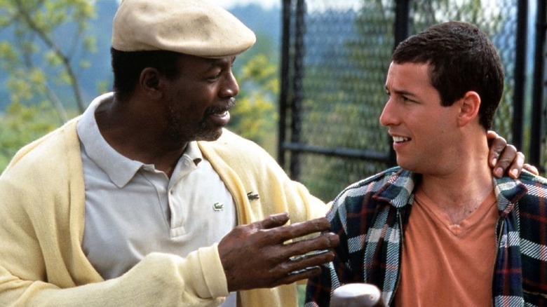 Chubbs Peterson puts a hand on Happy Gilmore's shoulder