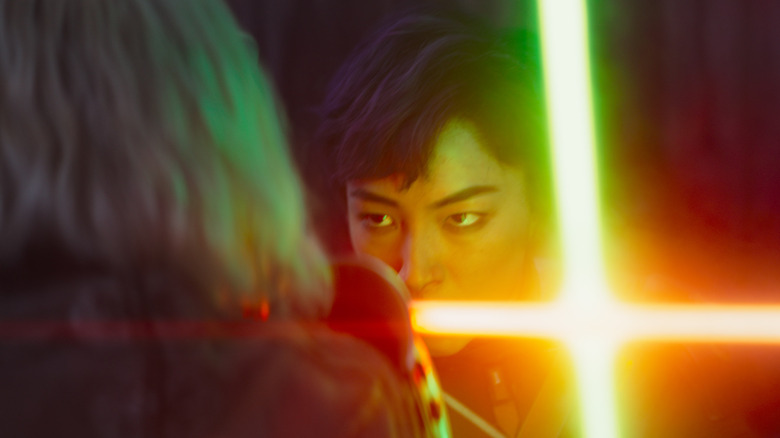 Sabine and Shin cross lightsabers