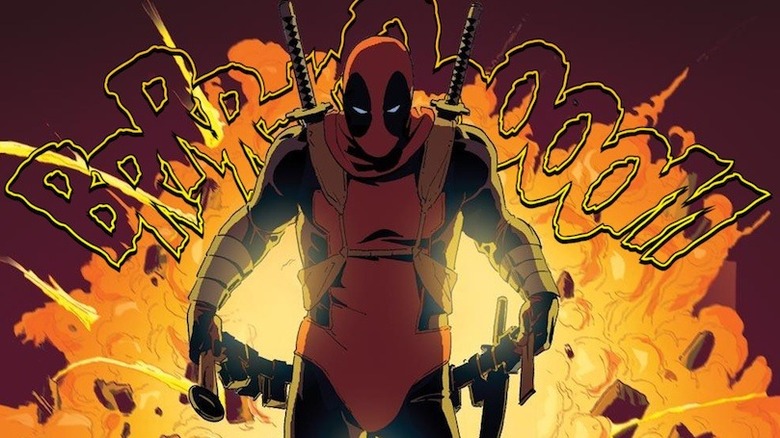 Deadpool standing by an explosion