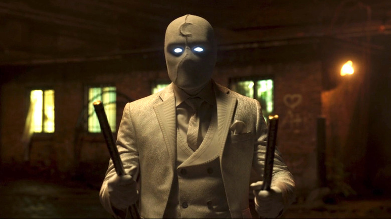 Moon Knight holding sticks