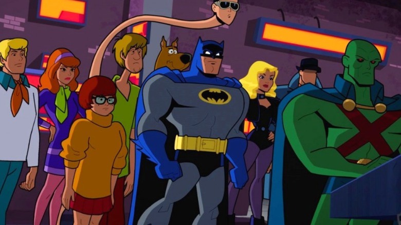 Batman, Mystery Inc., and the Justice League standing together