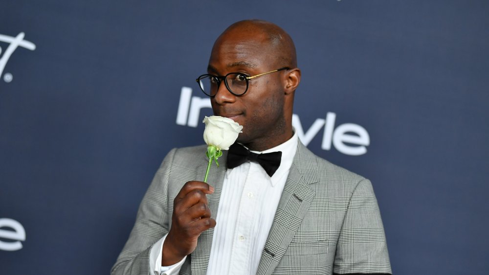 Barry Jenkins with a rose