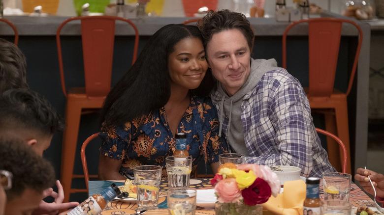 Zach Braff and Gabrielle Union cozying up in Cheaper By the Dozen