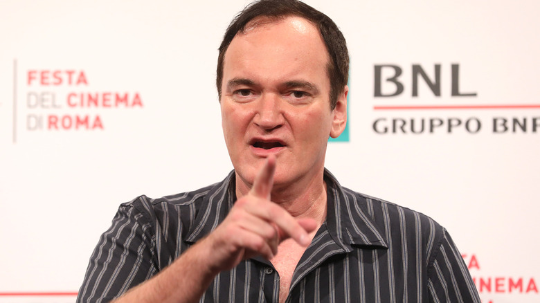 Quentin Tarantino pointing