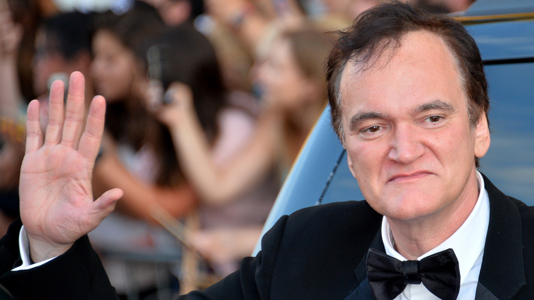 Quentin Tarantino waving