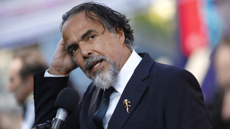 Alejandro G. Iñárritu fixing hair