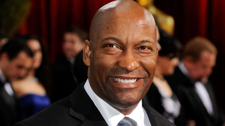 John Singleton smiles looking up