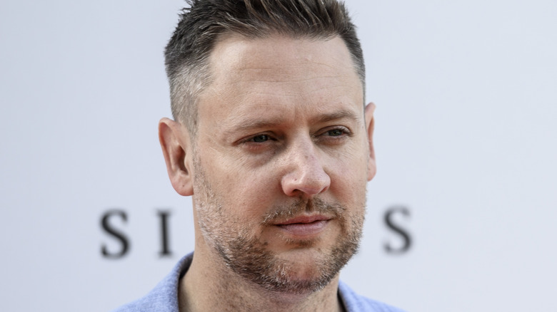 Neill Blomkamp squints on red carpet