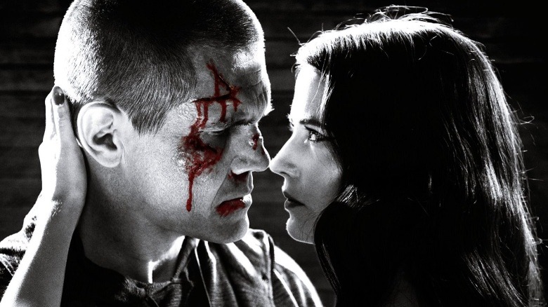 Josh Brolin kisses Eva Green