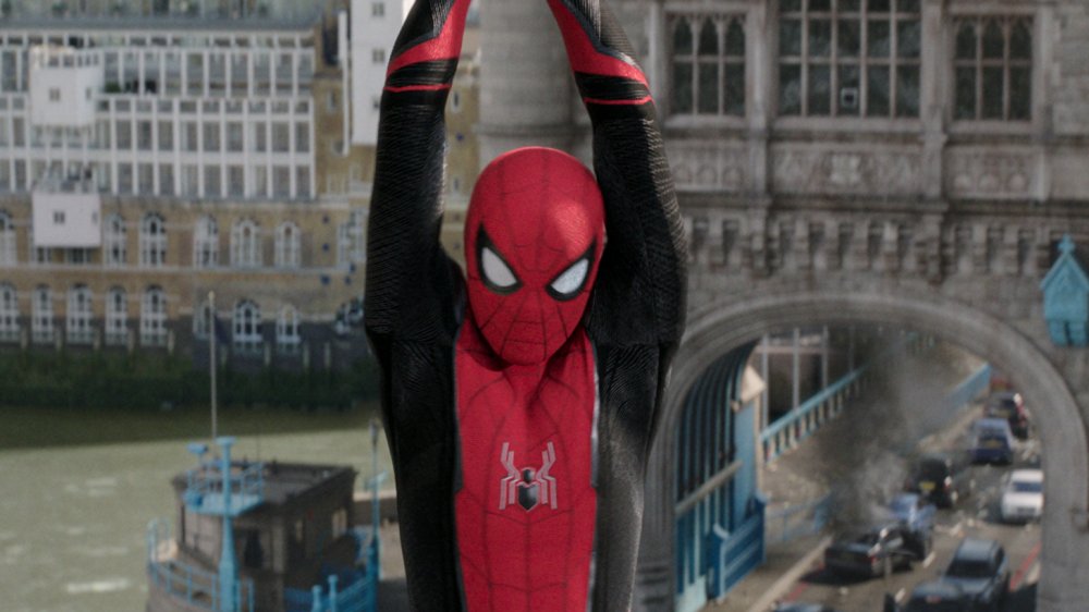 Tom Holland as Peter Parker swinging through London in Spider-Man: Far From Home