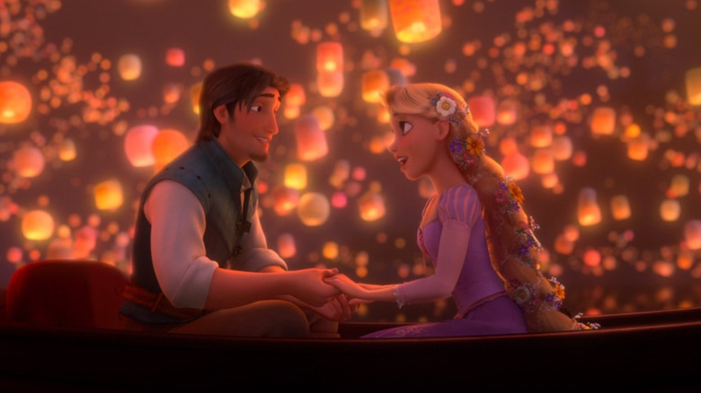 Flynn Rider holding Rapunzel's hands