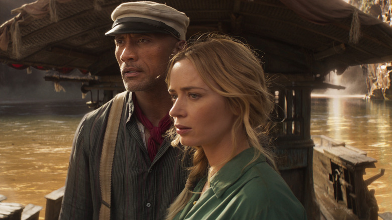 Dwayne Johnson and Emily Blunt in a boat