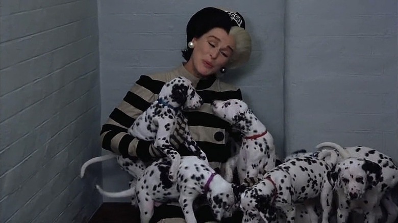 Cruella De Vil with Dalmatian puppies in "102 Dalmatians" (2000)