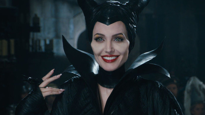 Maleficent smiles benevolently in "Maleficent" (2014)