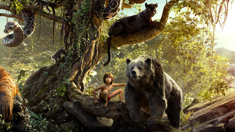 Mowgli and animals on tree