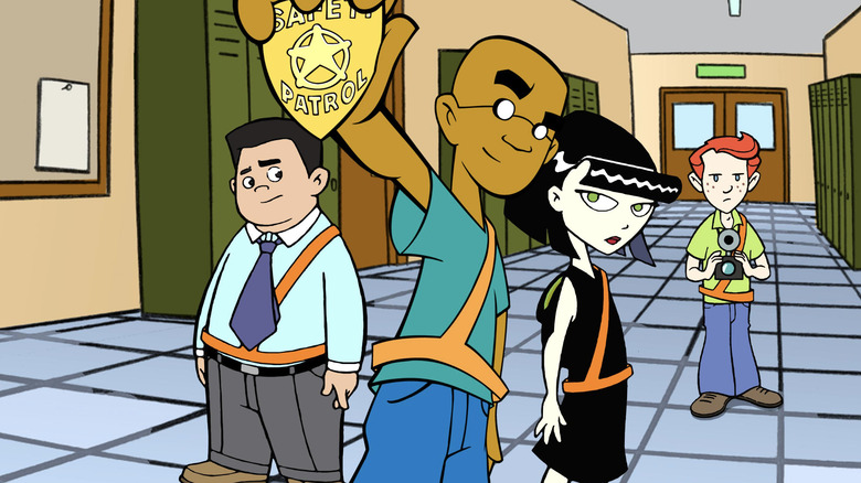 Fillmore holding badge by friends