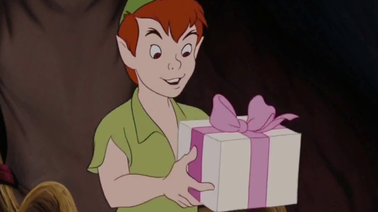 Peter holding his present