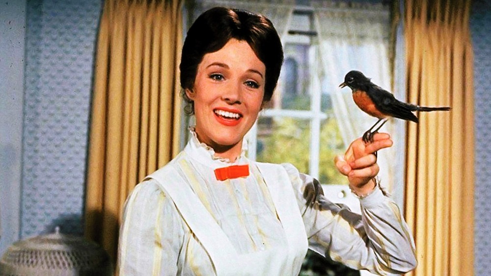 Mary Poppins holds bird