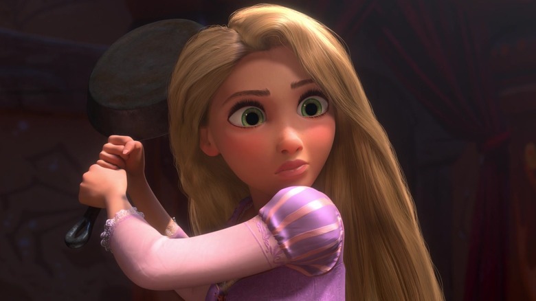 Rapunzel brandishing frying pan