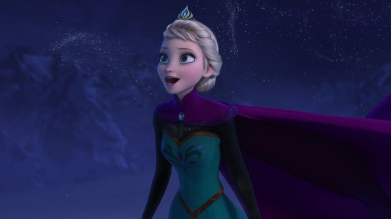 Elsa wearing purple cape