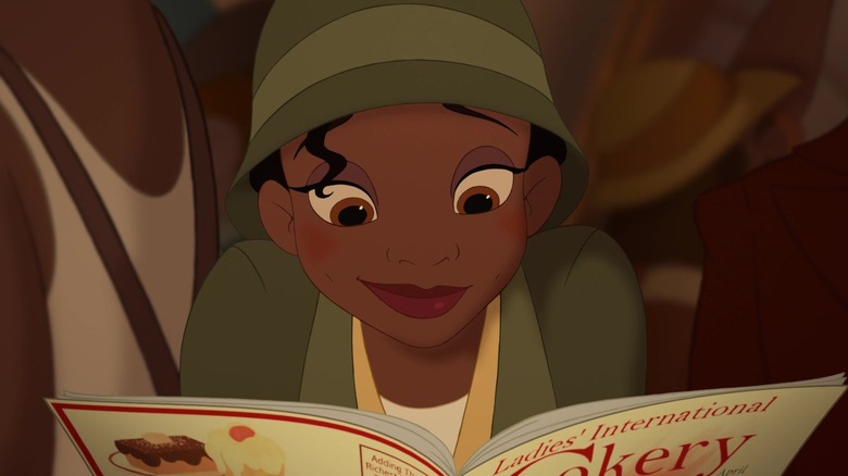 Tiana reading cooking magazine