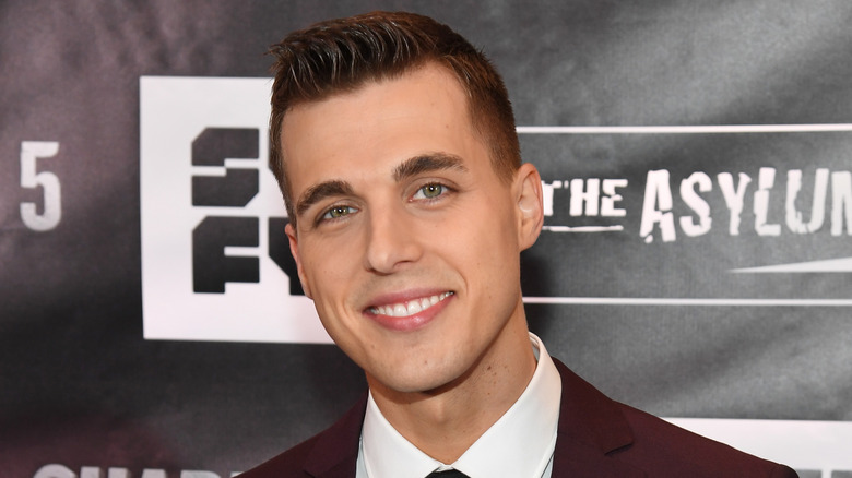 Cody Linley posing at a premier