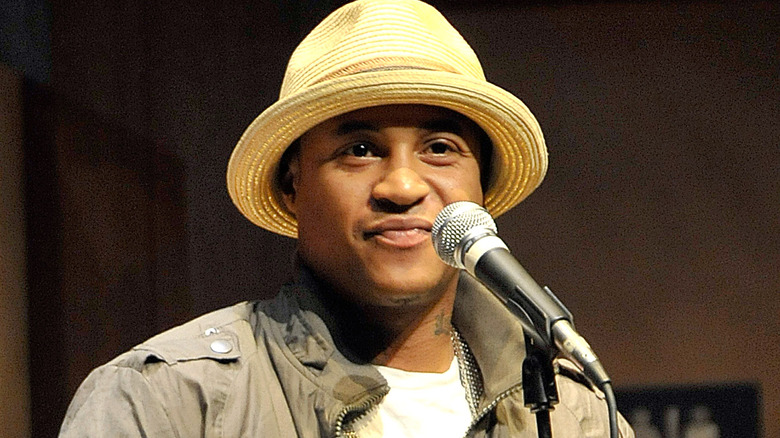 Orlando Brown speaking into microphone