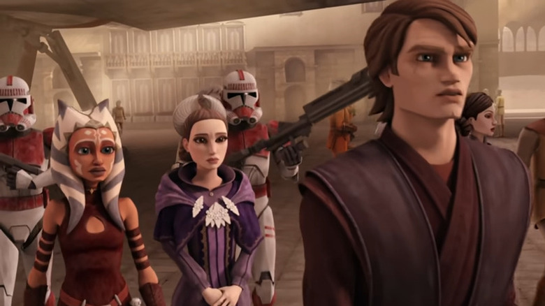 Ahsoka, Padme and Anakin standing in front of clone troopers