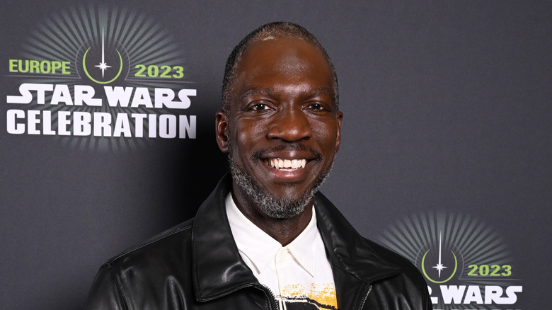 Rick Famuyiwa smiling at Star Wars event