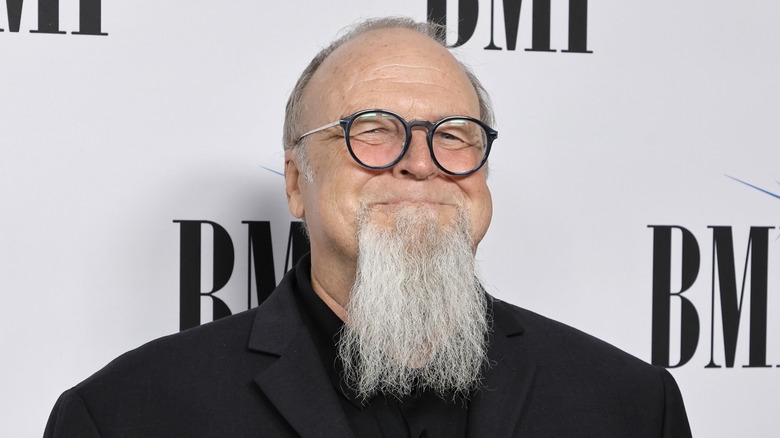 Kevin Kiner beaming with large beard and glasses