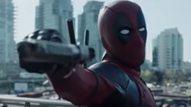 Deadpool pointing a gun