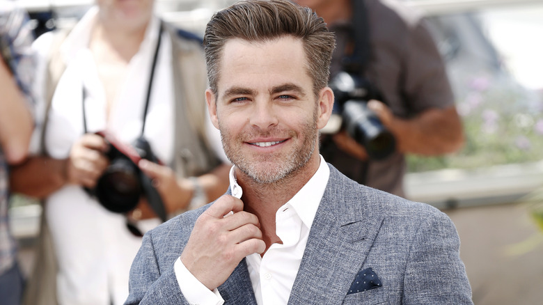 Chris Pine smiling at evet