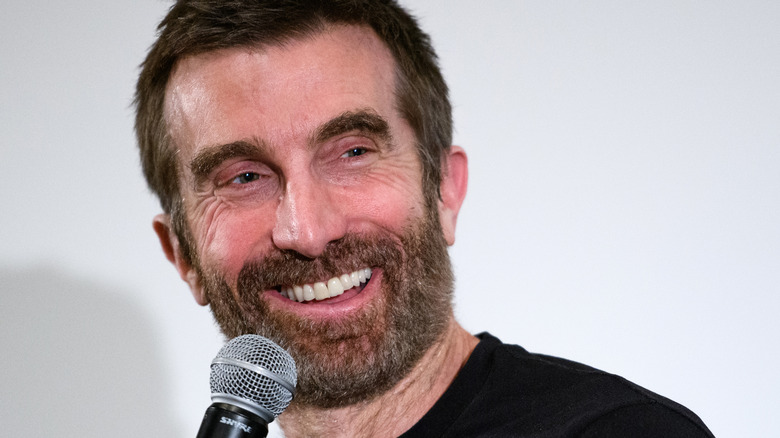 Sharlto Copley on the microphone